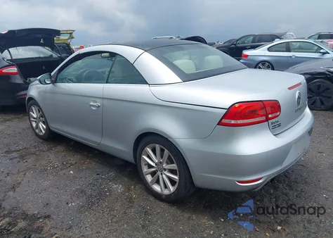 2012 Volkswagen Eos Komfort из США, поврежденный, VIN WVWBW7AH0CV006893